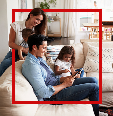 family comfortably sitting in living room