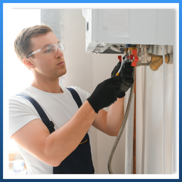 technician working on an HVAC system