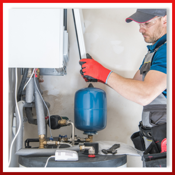 Contractor working with heating unit