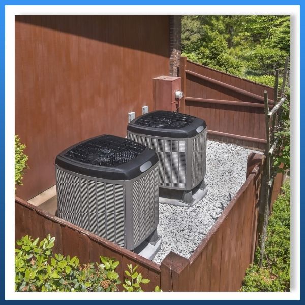 two AC units outside of house