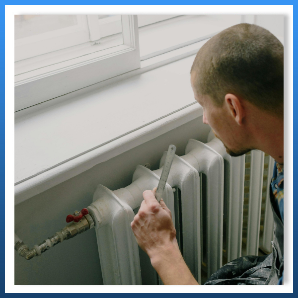 technician working on heater